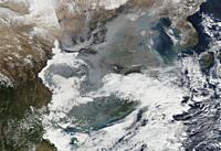 EARTH Eastern Asia -- 26 Jan 2017 -- This dramatic NASA satellite image shows the massive scale of serious air pollution across China - compounded by ...