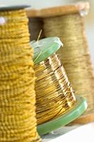 Gold and silver thread spools for cofrade crafts, Holy Week, Andalusia, Spain.