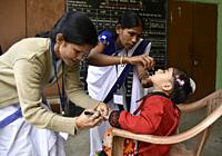 Guwahati, Assam, India. March 10, 2019. An Indian child receives polio vaccine drops on National Immunisation Day in Guwahati.