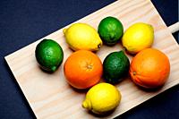 Lemons, Oranges and Limes on kitchen table