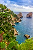 Sea view by Capri island, Italy. The rocks are famous as Faraglioni rock. Locals say that they have seen sirens on this rock and often hear their whis...