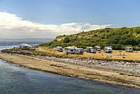 USA, WA, Whidbey Island, Coupville. RV´s at a campground on Penn Cove, in the San Juan Islands.