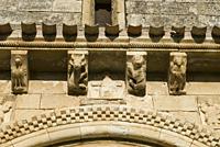 Facade and detail of the corbels representing the four evangelists, Church of San Pedro de Tejada, XII Century, the most beautiful Romanesque temple a...