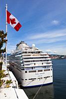 The Coral Princess cruise vessel taking on supplies and passengers at the Port of Vancouver in British Columbia Canada.