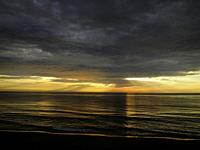 Sea turned to gold at sunrise, Virginia Beach Virginia.