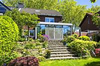 Oberhausen, Sterkrade, residential house with winter garden, single-family home, row house, garden side, flower garden, rock garden, rockery, outside ...