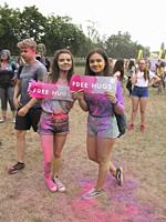 Girls with free hugs at Color festival, Krakow, Poland.