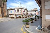 SES SALINES, MALLORCA, SPAIN - APRIL 15, 2019: Street view in central village on an overcast day in the beginning of tourist season.