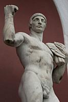 Detail of a marble statue of an athlete in a niche in the Foro Italico (sports complex). Rome, Italy, Europe.