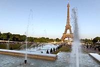Europe, France, Paris, 2019-06, Eiffel Tower monument viewd from the Trocadero gardins. People bathing in the fountains in an effort to cool down duri...