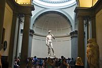 FLORENCE, ITALY, July 2018, Tourist watch the statue of DAVID by Michelangelo at Florence's Accademia gallery.