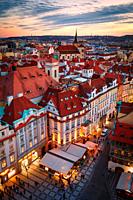 Prague, Czech Republic - March 12, 2019: Sunset view of the historical city centre of Prague from town hall tower.