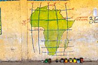 A hand painted map of Africa on a wall, depicting latitude and longitude, Debre Berhan, Ethiopia.