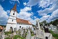 Holy Trinity Church and cemetery in small village of Sibiel famous from traditional Saxon architecture in Saliste commune, Transylvania in Romania.