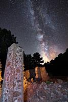Milky way in a ruins with a meteorite crossing it.