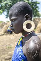 Young woman Mursi tribe Ethiopia.