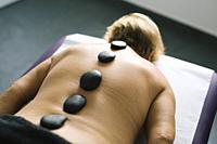 Woman Receiving Lastone Therapy.