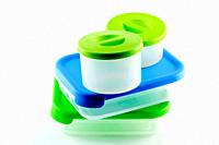 Blue and green tupperware isolated
