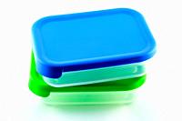 Isolated blue and green tupperware