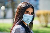 Girl with a protective mask to avoid contagion. Coronavirus concept.