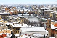 Ponte Vecchio or Old Bridge Florence Italy with snow panorama Tuscany.