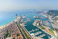 aerial view of barceloneta district and the port of barcelona