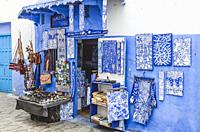 Typical arabic architecture in Asilah. Streets, doors, windows, shops. Morocco.