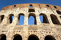 Architectural details of the facade of the Colosseum (Coliseum) or Flavian Amphitheatre, the largest Roman amphitheater located in city of Rome, Italy...