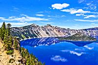 Wizard Island in Crater Lake at Crater Lake National Park in Oregon. Wizard Island is a 763-foot cinder cone in the lake.