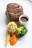 Grilled beef steak tenderloin with vegetable.