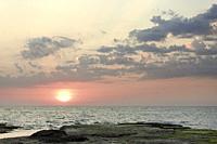 Sunrise at Cabo Cervera in Torrevieja, Alicante province in Spain. Horizontal shot with space for text.