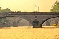 France. Stone bridges over the river Seine before sunset.