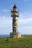 The Lighthouse of the Cantabrian town of Ajo (Bareyo) decorated by the international artist known as OKUDA SAN MIGUEL, despite the controversy that oc...
