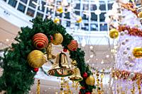 Christmas jingle bell hanging with christmas grass deco at mall.