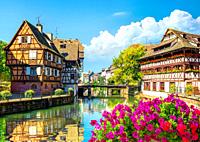 Picturesque district Petite France in Strasbourg, houses on river.