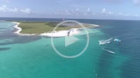 Caribbean-sea-Fantastic-landscape Kiteboarding in clear crystal water, from drone in Los Roques venezuela -