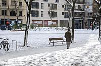 Madrid, Spain. 10 th January 2021. View of a man in Chamberi quarter after the Filomena snow storm.