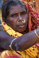 Koraput, India Portrait of an Adivasi woman from the Kondh tribe in the Koraput market in Odisha, India.