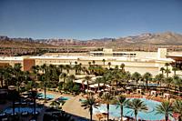 A majestic mountain range lies on the horizon near the Red Rock Casino Resort and Spa in Las Vegas, Nevada.