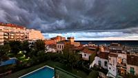 Stormy clouds at sunset, dramatic sky, coastal landscape, weather scenery El Masnou, Barcelona, Spain