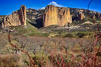 The Riglos mallos are geological formations consisting of vertical-walled rocks, called mallos, located in the Spanish town of Riglos, in the province...