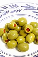 Closeup of stuffed green olives.