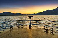 Lake Iseo or Lago d'Iseo, Lombardy, Italy. Scene over lake at sunset.