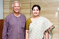 Bangladesh. “ September 20, 2012: Muhammad Yunus a popular economist with a colleague at Grameen centre, Dhaka.