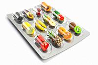 Multivitamins and dietary natural supplements for a healthy diet. Fruits in pills on blister pack. 3d illustration.