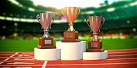Sport trophy cups on pedestal at the stadium. Competition, championship winners reward. 3d illustration.
