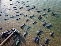 Fishing boats in row at jetty at Malaysia, Asia.