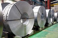 rolls of steel sheet in a plant, galvanized steel coil.