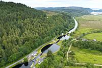 Aerial view from drone of flight of locks on the Crinan Canal in Argyll & Bute, Scotland, UK.