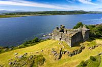 Aerial view from drone of Castle Sween in shore of Loch Sween in Argyll & Bute, Scotland, UK.